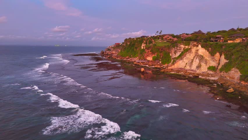 Uluwatu beach. Uluwatu beach has the best sunsets in Bali. Royalty-Free Stock Footage #3454394181
