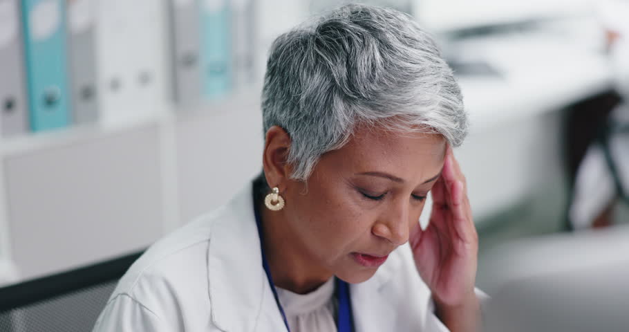 Woman, senior doctor and headache in lab, pain and stress with medical research crisis and burnout. Migraine, hurt and scientist with brain fog, fatigue and temple massage for tension in workplace Royalty-Free Stock Footage #3454408157