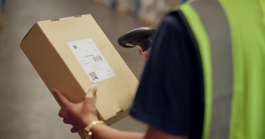 Person, hands and box with scanner for pricing, logistics or barcode in supply chain or shipping industry at warehouse. Closeup of employee or storage manager scanning parcel, package or inventory