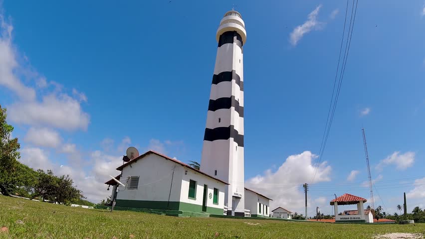 Mandacaru Lighthouse At Barreirinhas Maranhao Brazil. Navigation Barreirinhas Maranhao. Coast Sky Clouds City Seaside. Coast Outside City Beach Panorama. Coast Seaside Backgrounds Landmark. Royalty-Free Stock Footage #3454577135