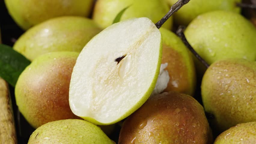 fresh ripe pears with half as background Royalty-Free Stock Footage #3454598681