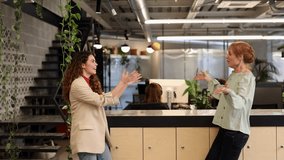 Women juggling apples in modern office amidst laughter and jokes - Powered by Shutterstock - Get 15% off with code: PIKWIZARD15