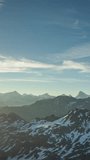 timelapse of verbier mont fort at sunrise mountain peak, swiss alps in vertical