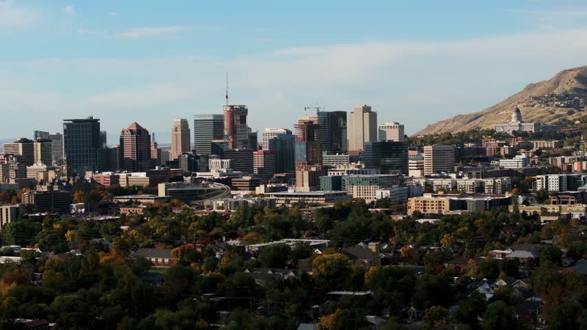 Central downtown Salt Lake City with skyscrapers and modern buildings, Utah. Aerial drone view and sky for copy space