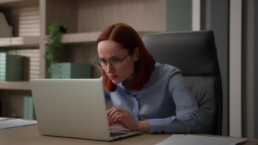 Caucasian businesswoman in office work with computer laptop confused with blurry vision business woman female worker manager off glasses check optical lenses problem bad eyesight focused see focusing