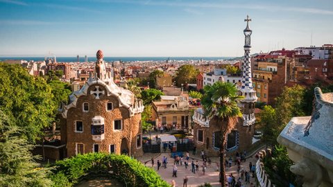 Barcelona, Spain, time lapse view of Park Guell and Barcelona cityscape at sunset.