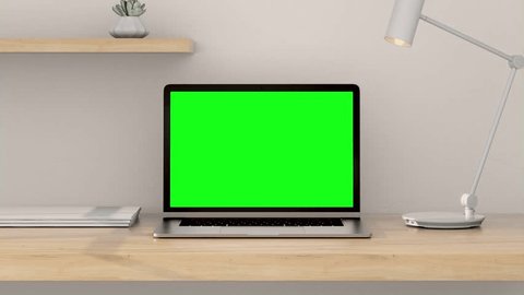 3D Laptop Green Screen Display on Home Work Room Background Mock-up. Empty Green Monitor Animation for Video Call, Website Template or Game Applications. One Blank Technology Zoom render on Desk 4k Arkistovideo