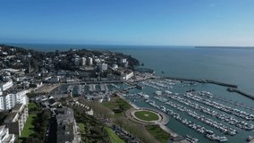 Torquay, Torbay, South Devon, England: DRONE VIEWS: The drone shows moored boats and yachts in Torquay Marina. Torquay is a popular UK holiday resort and a water sports hub (Clip 3).