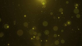 Background video with shining golden balls of light (transparency processing)