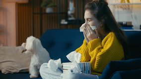 Teen girl sneezing and wiping nose with tissue, allergy to pet's fur, healthcare - Powered by Shutterstock - Get 15% off with code: PIKWIZARD15