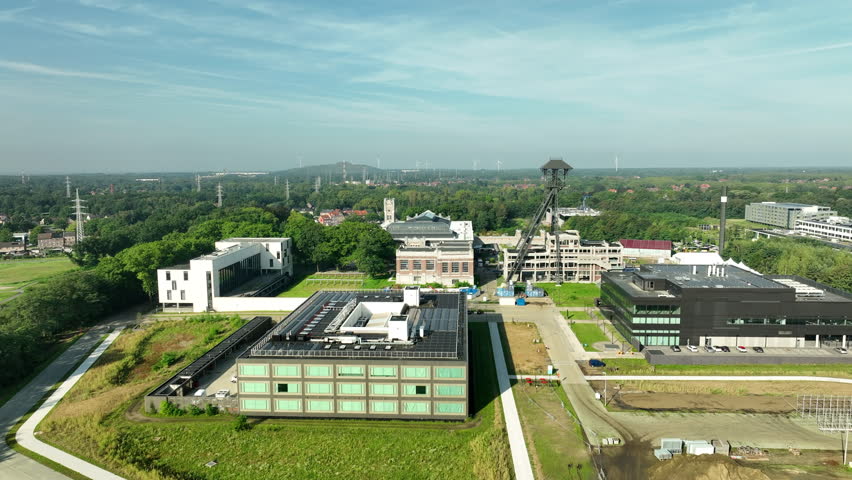 Buildings of Thor Park scientific and technological incubator, Belgium. Aerial tilt down Royalty-Free Stock Footage #3454909581