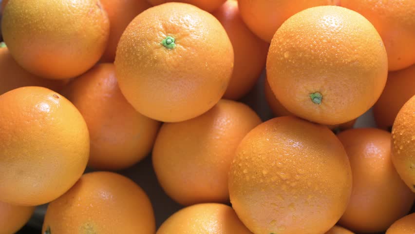 Lots of juicy and fresh oranges ready to eat. Healthy food concept. Royalty-Free Stock Footage #3454910801