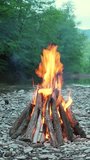 Close-Up Campfire Near Mountain River On Rocky Shore Video
