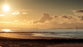 4K time lapse video of sunset over Prestatyn beach, North Wales