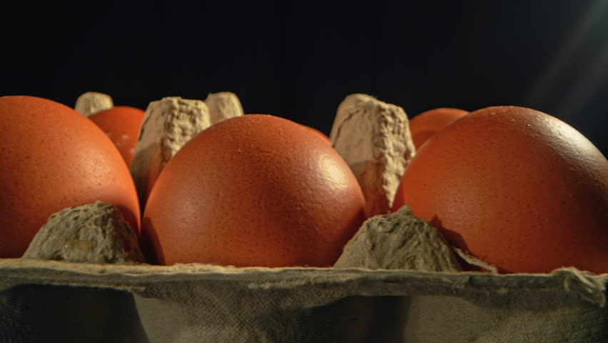 4k shot of eggs box. Raw hen's eggs. Fresh eggs for sale at a market. Healthy organic food ingredients for breakfast. Animal products. Grocery. Chicken fresh eggs Royalty-Free Stock Footage #3455007559