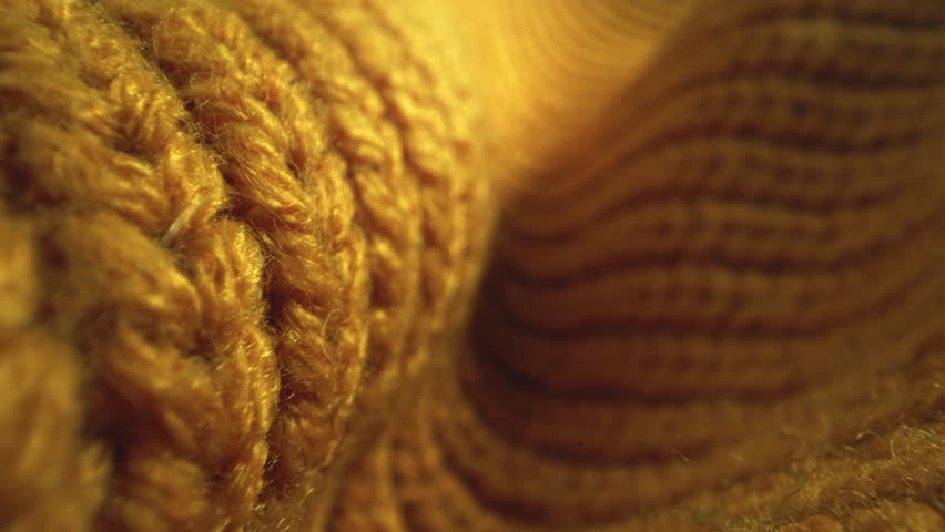 Macro shot of woollen fabric. Slider dolly extreme close-up of clothing material fabric texture. Woollens, wool fibers. Warm winter clothing. Shot with laowa 24mm probe lens Royalty-Free Stock Footage #3455008255