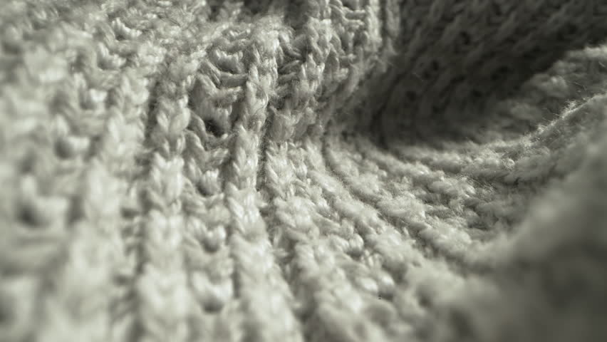 Macro shot of woollen fabric. Slider dolly extreme close-up of clothing material fabric texture. Woollens, wool fibers. Warm winter clothing. Shot with laowa 24mm probe lens Royalty-Free Stock Footage #3455008891
