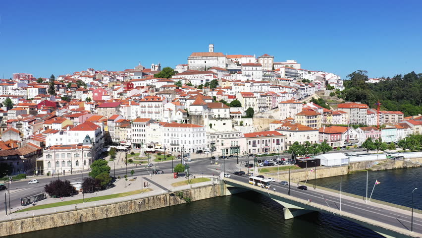 The Mondego River in front of the city center of Coimbra , Europe, Portugal, Center, in summer on a sunny day.