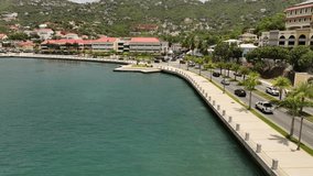 Aerial video of luxury motor yachts at Long Bay Marina at Charlotte Amelie Cruise Port in St. Thomas, US Virgin Islands, Caribbean