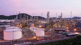 Aerial view footage B roll light oil terminal is industrial facility for storage of oil and petrochemical. oil manufacturing products. power electric plant. low light. Footage b roll drone shot 4k. - Powered by Shutterstock - Get 15% off with code: PIKWIZARD15