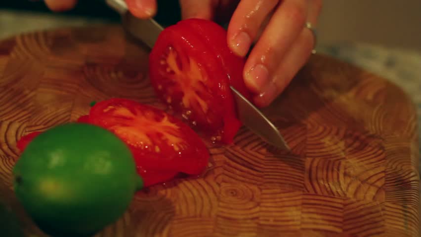 slicing vegetables of a dinner salad