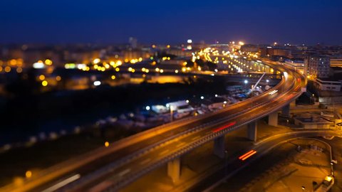 Time Lapse of freeway traffic in Pescara, Abruzzi, Italy, during night. Tilt and shift.