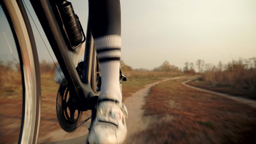 Gravel Cyclist Riding On Gravel Bike In Slow Motion. Cyclist Athlete Workout Riding On Gravel Bicycle. Triathlete Exercise On Road Bike On Trail Road Enhance Skills. Cardio Gravel Cycling Trail Cross Royalty-Free Stock Footage #3455207045