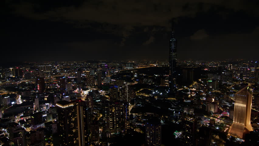 expansive nocturnal view of Kuala Lumpur, showcasing the city