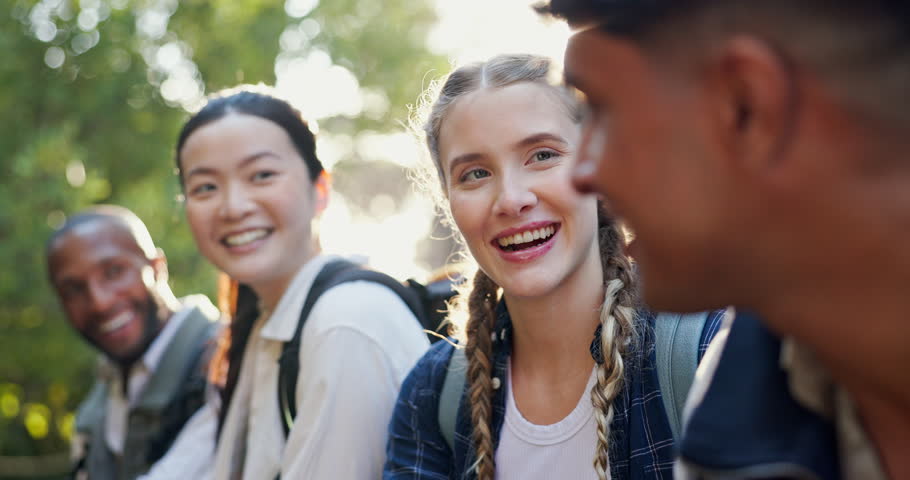 Nature, talking and friends on hiking break on outdoor adventure in conversation or discussion in woods. Relax, diversity or happy people speaking on holiday, journey or vacation in forest for travel