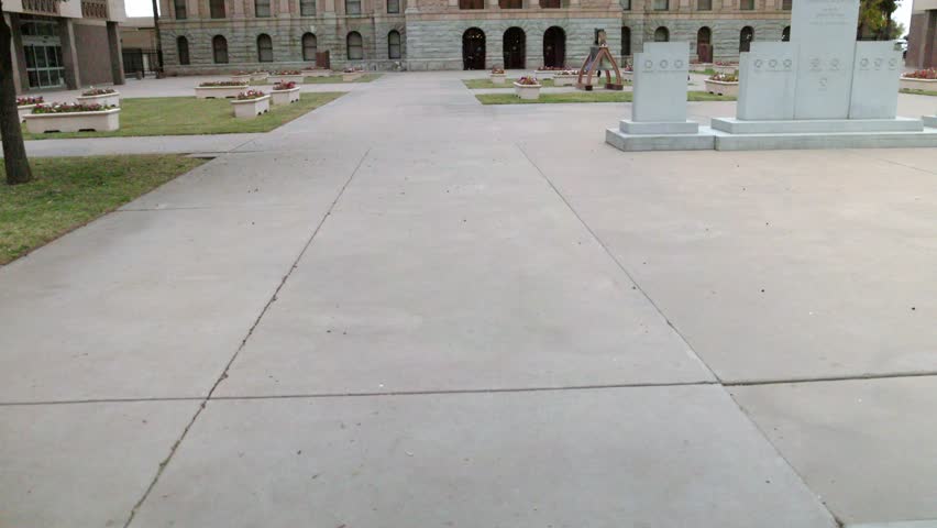 Arizona state capitol building in Phoenix, Arizona with close up view tilting up.
