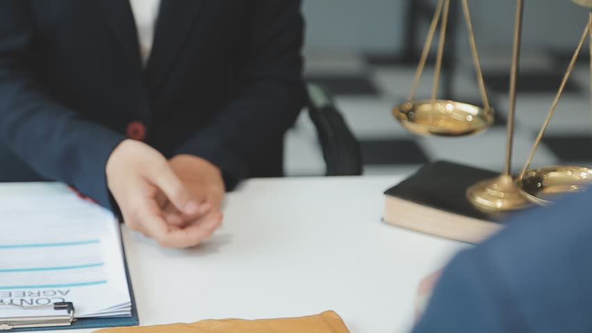 Mediation client meeting lawyer consulting government help, Businessman and Male lawyer or judge consult having team meeting with client, Law and Legal services concept. Royalty-Free Stock Footage #3455478059