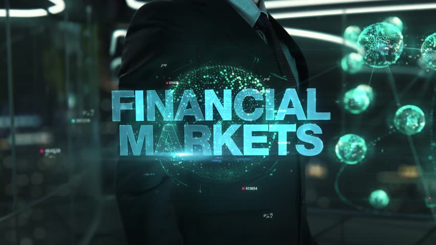 Businessman with Financial Markets hologram concept