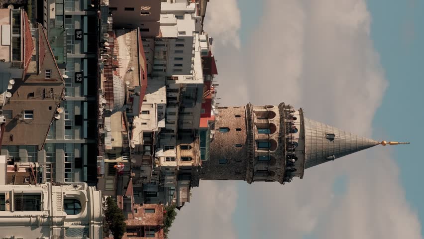 Galata tower in Istanbul in Turkey. Galata Kulesi Museum, Beyo lu district, quarter. Historical place. Vertical video.