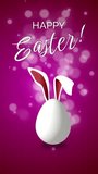 White jumping Easter egg with bunny ears. Happy Easter. Looped festive animation on pink background with blurred circles. Vertical video.