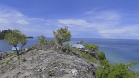 Aerial footage of traditional bajau village in togean, Papan island, Central sulawesi, Indonesia.