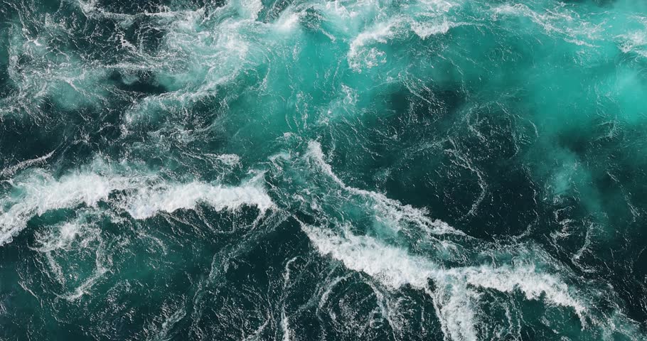 Blue waves of water of the river and the sea meet each other during high tide and low tide. Royalty-Free Stock Footage #3455940653