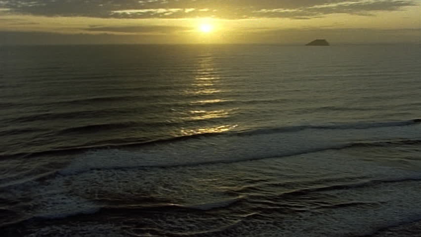 Beautiful sunset over ocean and beach