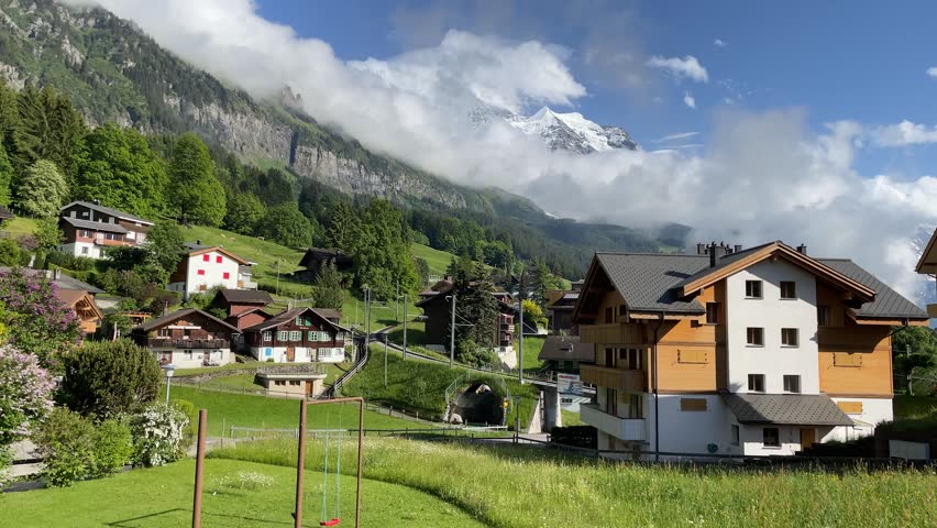 Timeless beauty of Wengen, Switzerland alpine village with panoramic mountains, Wengen offers a picturesque escape for every season. 