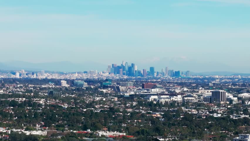 Drone aerial shot of the los angeles skyline in california on sunny day