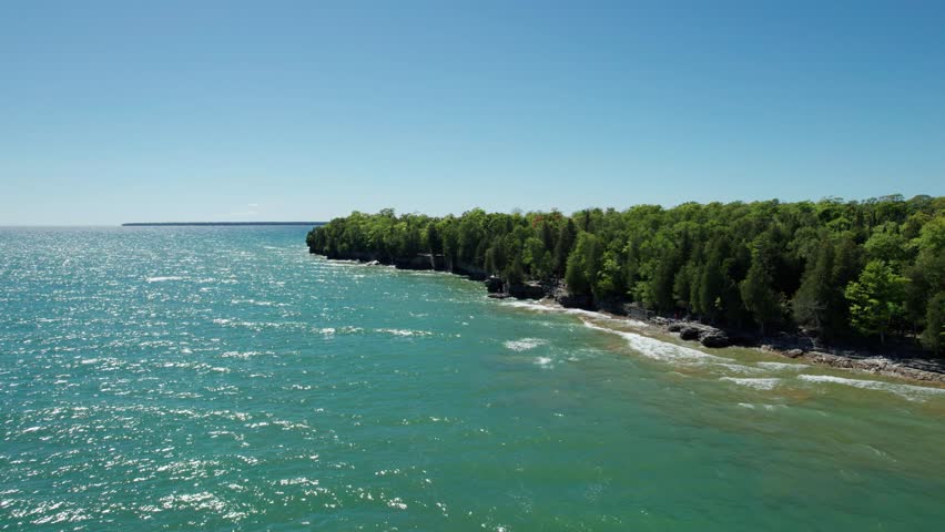 Drone aerial view of the blue waters of lake Michigan near door county