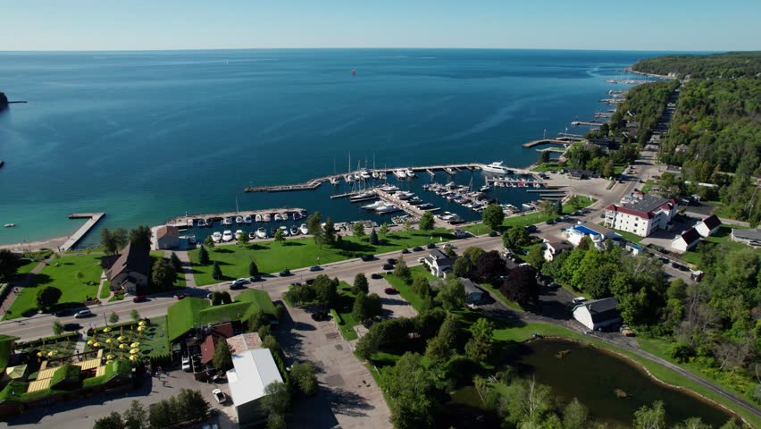 Drone shot flying over sister bay, Wisconsin and showing lake Michigan