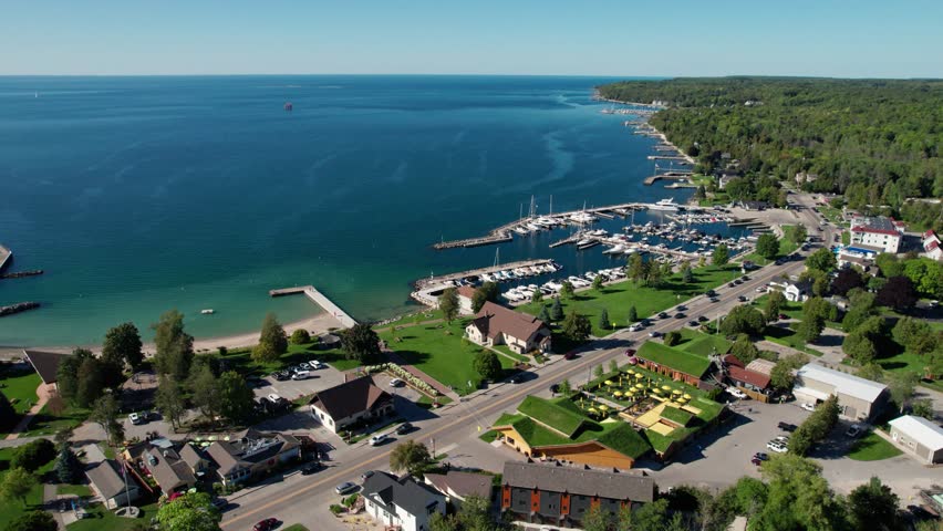 Drone shot flying over the harbor in sister bay, Wisconsin on summer day