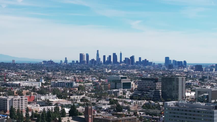 Static drone aerial shot of the Los Angeles skyline with some smog