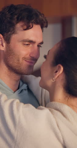 Forehead, care or happy couple hug in kitchen for romance, love or bond together in an intimate connection. Eye contact, man or romantic woman in embrace to celebrate marriage anniversary at home Royalty-Free Stock Footage #3456258877