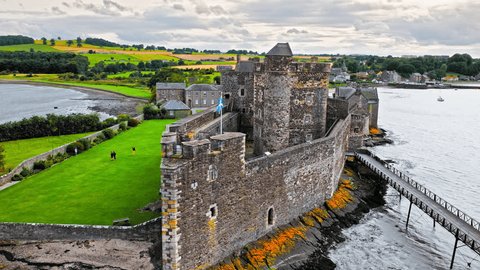 Aerial view of Blackness Castle, shiplike form fortress in  Blackness, Scotland. Castle with rampart views stands on a rocky spit in the Firth of Forth, Scotland.: stockvideo