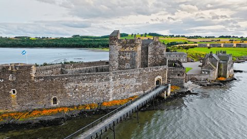 Aerial view of Blackness Castle, shiplike form fortress in  Blackness, Scotland. Castle with rampart views stands on a rocky spit in the Firth of Forth, Scotland.の動画素材