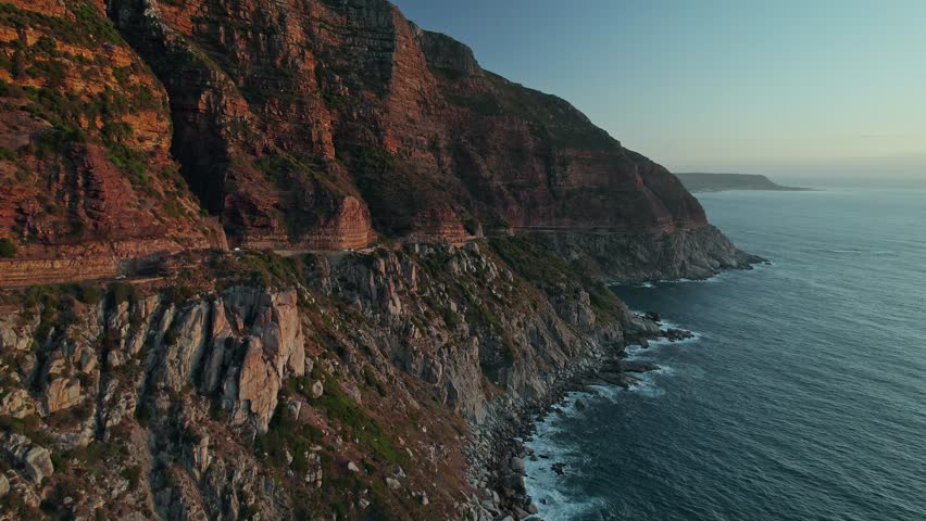 Chapman's Peak Drive, Carved On Steep Cliffs In Cape Town, South Africa. Aerial Drone Shot  Royalty-Free Stock Footage #3456537377