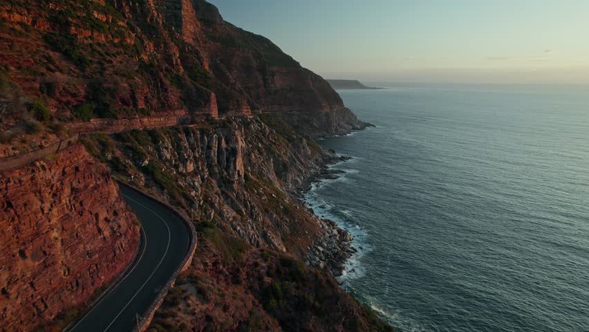 Winding Road Of Chapman's Peak Drive During Sunset In Cape Town, South Africa. Aerial Drone Shot Royalty-Free Stock Footage #3456537445
