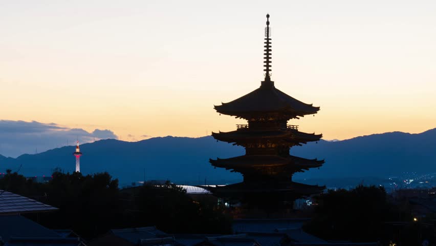 timelapse kyoto city aerial skyline view to ancient Yasaka pagoda building and Kyoto Tower at the back in higashiyama, Kyoto old town with sunset sky ,famous landmark building in Kyoto japan Royalty-Free Stock Footage #3456591125