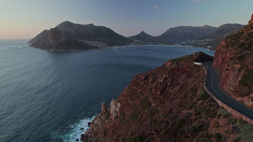 Fly Over Chapman's Peak Drive Overlooking Hout Bay During Sunset In Cape Town, South Africa. Aerial Drone Shot  Royalty-Free Stock Footage #3456615383